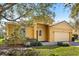 Lovely single-Gathering home with a well-kept lawn, brick driveway, and welcoming entrance at 9122 Stromboli Ct, Kissimmee, FL 34747