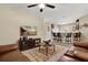 Open-concept living area with bar seating and access to the modern kitchen at 9122 Stromboli Ct, Kissimmee, FL 34747