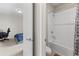 Bright bathroom featuring a shower and tub combo at 9947 Summerlake Groves St, Winter Garden, FL 34787
