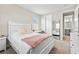Charming bedroom featuring a cozy bed and mirrored closet at 9947 Summerlake Groves St, Winter Garden, FL 34787