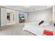 Spacious primary bedroom with large windows and ample closet space at 9947 Summerlake Groves St, Winter Garden, FL 34787