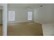 Spacious living room area with natural light and potential for customization at 2930 Paddington Way, Kissimmee, FL 34747