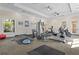 Bright fitness center featuring modern exercise machines and natural light at 1361 Tuscan Ter # 7105, Davenport, FL 33896