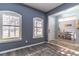 Inviting entryway with wood floors and natural light, leading to a dining area at 1411 Ellis Fallon Loop, Oviedo, FL 32765