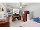 Bright bedroom with built-in shelving and a ceiling fan at 1432 Northridge Dr, Longwood, FL 32750