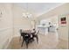 Dining Area featuring modern decor, open layout and connections to the kitchen at 1493 Hyde Park Dr, Winter Park, FL 32792