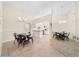 Dining Area featuring modern decor, open layout and connections to the kitchen at 1493 Hyde Park Dr, Winter Park, FL 32792