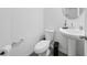 Bright powder room featuring a pedestal sink and toilet at 15036 Willow Arbor Cir, Orlando, FL 32824