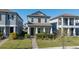 Inviting two-story home features a cozy front porch and well-manicured lawn and landscaping at 15036 Willow Arbor Cir, Orlando, FL 32824