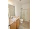 Bathroom featuring a shower, vanity, and ceramic tile floor at 17519 Blessing Dr, Clermont, FL 34714