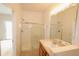 Clean bathroom featuring a stand-up shower with sliding glass doors at 17519 Blessing Dr, Clermont, FL 34714