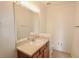 Bright bathroom with a large mirror, vanity, and good lighting at 17519 Blessing Dr, Clermont, FL 34714