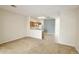 Living room featuring neutral walls and carpet flooring at 17519 Blessing Dr, Clermont, FL 34714