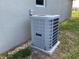 Modern AC Unit on an exterior side of a home at 1958 Sawfish Dr, Kissimmee, FL 34759