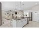 Kitchen island flowing into the living and dining areas for seamless entertaining at 2091 Brillante Dr, St Cloud, FL 34771