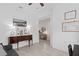 Cozy living room featuring neutral paint and trim, tile floors, and plenty of space to enjoy at 2091 Brillante Dr, St Cloud, FL 34771