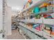Walk-in pantry with wire shelving providing ample storage for food items and household goods at 2091 Brillante Dr, St Cloud, FL 34771