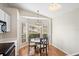 Bright dining area featuring a window bay and sleek flooring at 2209 Hannah Ln, Orlando, FL 32826