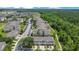 Aerial view of a residential neighborhood surrounded by lush greenery and well-maintained landscaping at 2318 Silver Palm Dr, Kissimmee, FL 34747