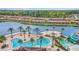 Aerial view of the community resort-style pool and surrounding residences at 2647 Corvette Ln, Kissimmee, FL 34746