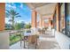 Inviting outdoor seating area with a table and chairs, perfect for enjoying the serene surroundings at 2647 Corvette Ln, Kissimmee, FL 34746