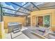 A covered patio includes a hot tub, outdoor furniture, and seating at 2647 Corvette Ln, Kissimmee, FL 34746