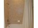 Bathroom with shower/tub combination and a shower curtain for privacy at 2657 Youngford St, Orlando, FL 32824