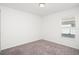 Neutral bedroom with gray carpet, a window and overhead lighting at 3201 Sweet Acres Pl, St Cloud, FL 34772