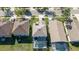 Aerial view of the property featuring a screened-in pool and backyard at 5239 Los Palma Vista Dr, Orlando, FL 32837