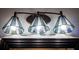 Elegant bathroom vanity light fixture with decorative glass shades and sleek design at 524 W Winter Park St, Orlando, FL 32804