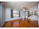 Open living area with wood floors and abundant natural light through large windows at 524 W Winter Park St, Orlando, FL 32804