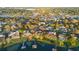 Gorgeous aerial view of lakefront homes, with mature trees and manicured lawns in a desirable neighborhood at 535 Spring Club Dr, Altamonte Springs, FL 32714