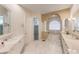 Luxurious bathroom with double vanity, a soaking tub, and a separate shower at 535 Spring Club Dr, Altamonte Springs, FL 32714