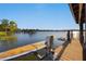 Modern boat dock with lift offering direct access to the lake at 535 Spring Club Dr, Altamonte Springs, FL 32714