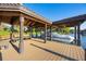 Covered boat dock with seating providing the perfect spot for relaxation at 535 Spring Club Dr, Altamonte Springs, FL 32714