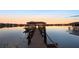 Picturesque sunset view of the lake from the private dock at 535 Spring Club Dr, Altamonte Springs, FL 32714