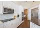 This bright kitchen features stainless steel appliances, and ample cabinet space at 535 Spring Club Dr, Altamonte Springs, FL 32714