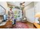 Charming home office with custom shelving and natural light from a window seat at 535 Spring Club Dr, Altamonte Springs, FL 32714