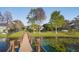 Scenic walkway leading to the waterfront and covered boat dock at 535 Spring Club Dr, Altamonte Springs, FL 32714