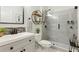 Modern bathroom with glass shower and vanity at 5571 Sycamore Canyon Dr, Kissimmee, FL 34758