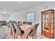 Dining room with seating for six and a vintage china cabinet at 659 Daring Dr, Davenport, FL 33837