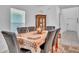 Dining room with seating for six and a vintage china cabinet at 659 Daring Dr, Davenport, FL 33837