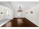 Bright entryway featuring marble floors, decorative light fixtures, and white walls at 729 Strihal Loop, Oakland, FL 34787