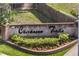 View of the 'Chickasaw Trails' brick community welcome sign at 8534 Black Mesa Dr, Orlando, FL 32829