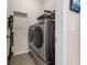 Functional laundry room with stacked washer and dryer at 8813 Tatara, Orlando, FL 32836