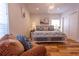 Bedroom featuring wood floors, floral accents, and a modern chandelier at 8929 Charleston Park # 12, Orlando, FL 32819