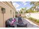 Cozy patio with stylish furniture and landscaped yard at 8929 Charleston Park # 12, Orlando, FL 32819