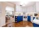 Well-lit kitchen with stainless steel appliances and ample counter space at 936 N Baker St, Mount Dora, FL 32757