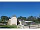 Exterior view of a building with clear blue skies in the background at 116 Crown Oaks Way # 116, Longwood, FL 32779