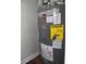 Close up of a Rheem water heater showing energy guide label and other details at 116 Crown Oaks Way # 116, Longwood, FL 32779